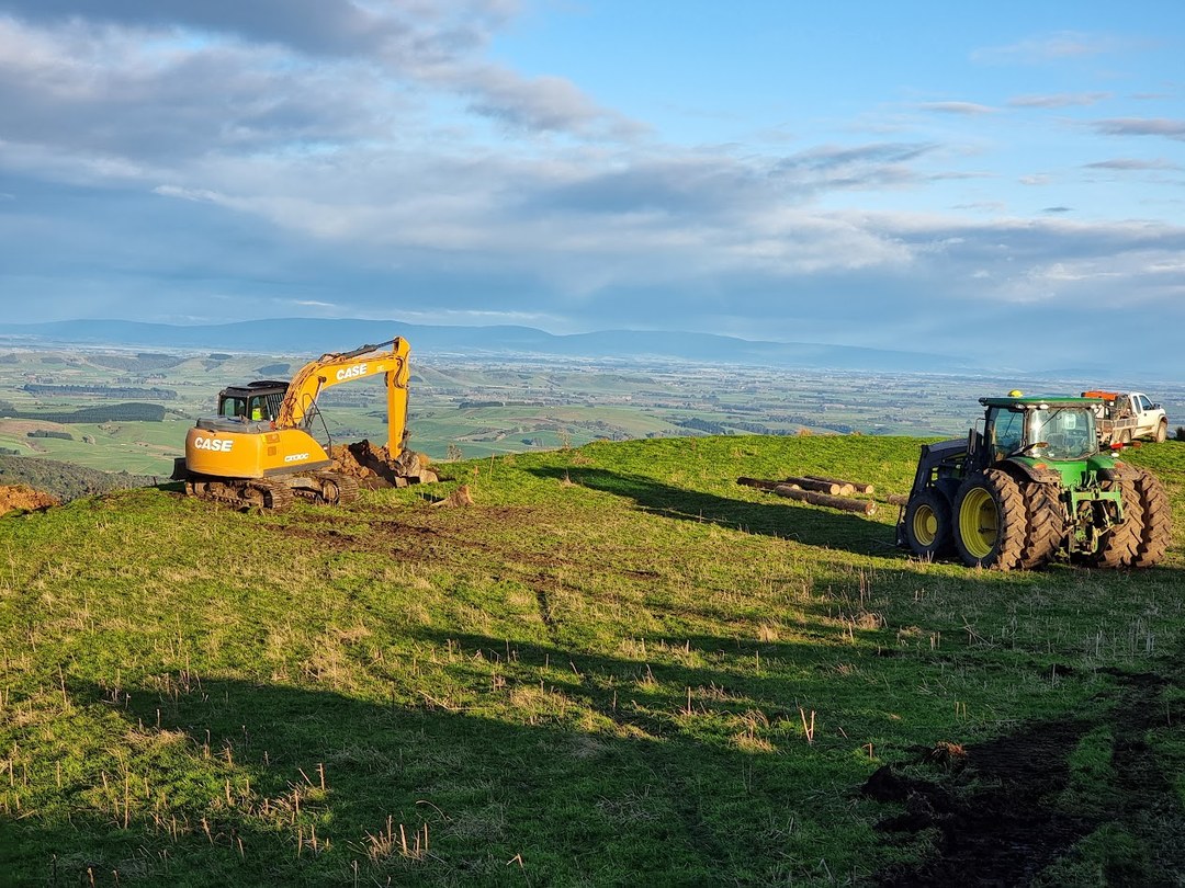 Hokonui Wind Farm — excavator and tractor carrying out siteworks on the ridge